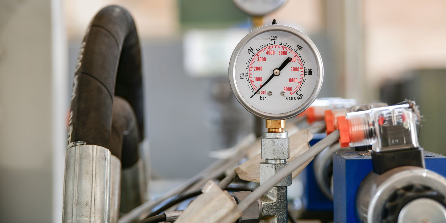 high-pressure-pump-gauge Pressure gauge on a high-pressure water pump.