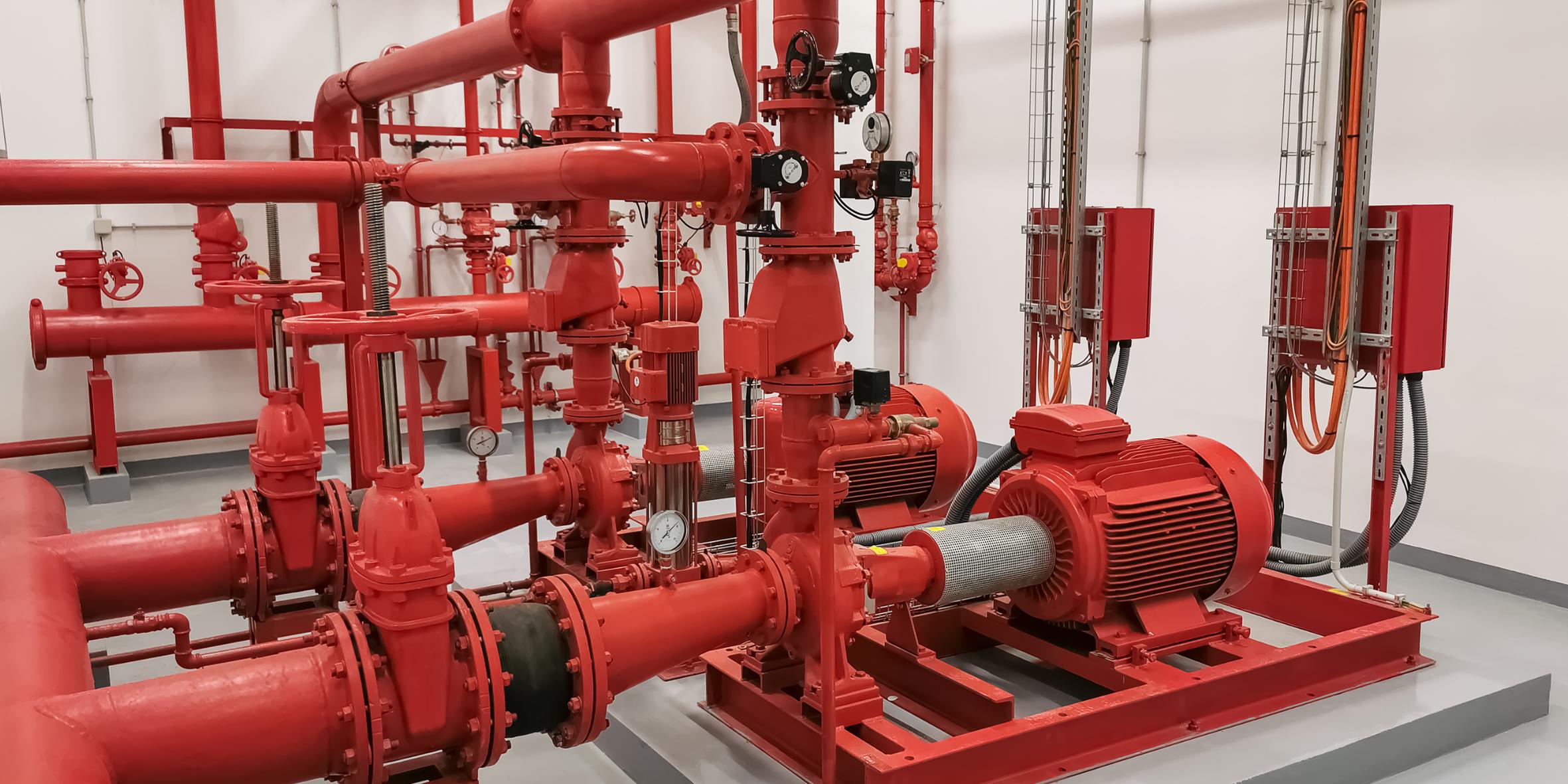 Red pipes in fire pump system.