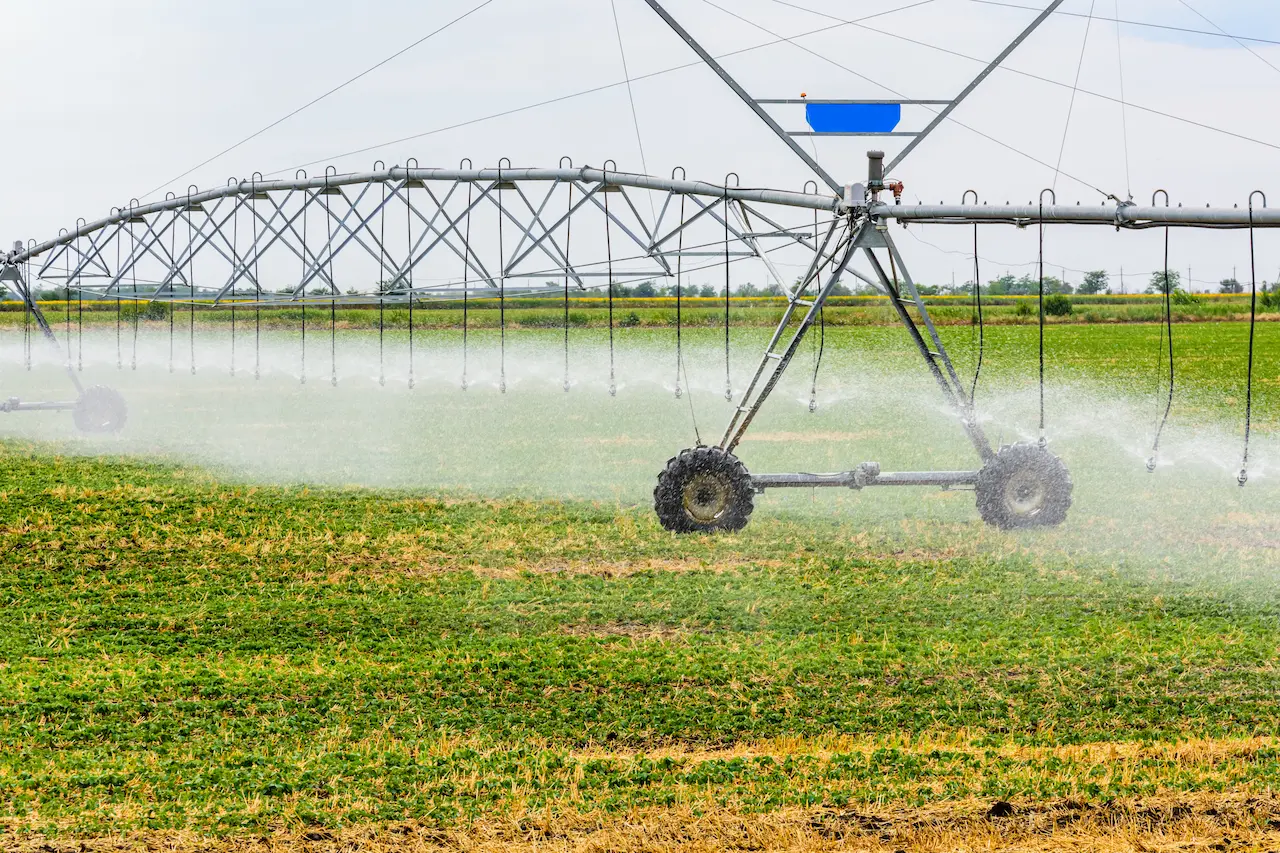 Irrigation system in operation on agriculture farm.