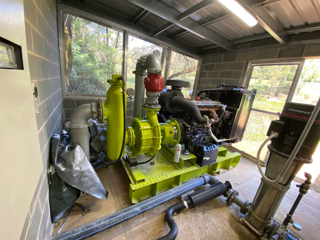 Commercial pump installation in building.